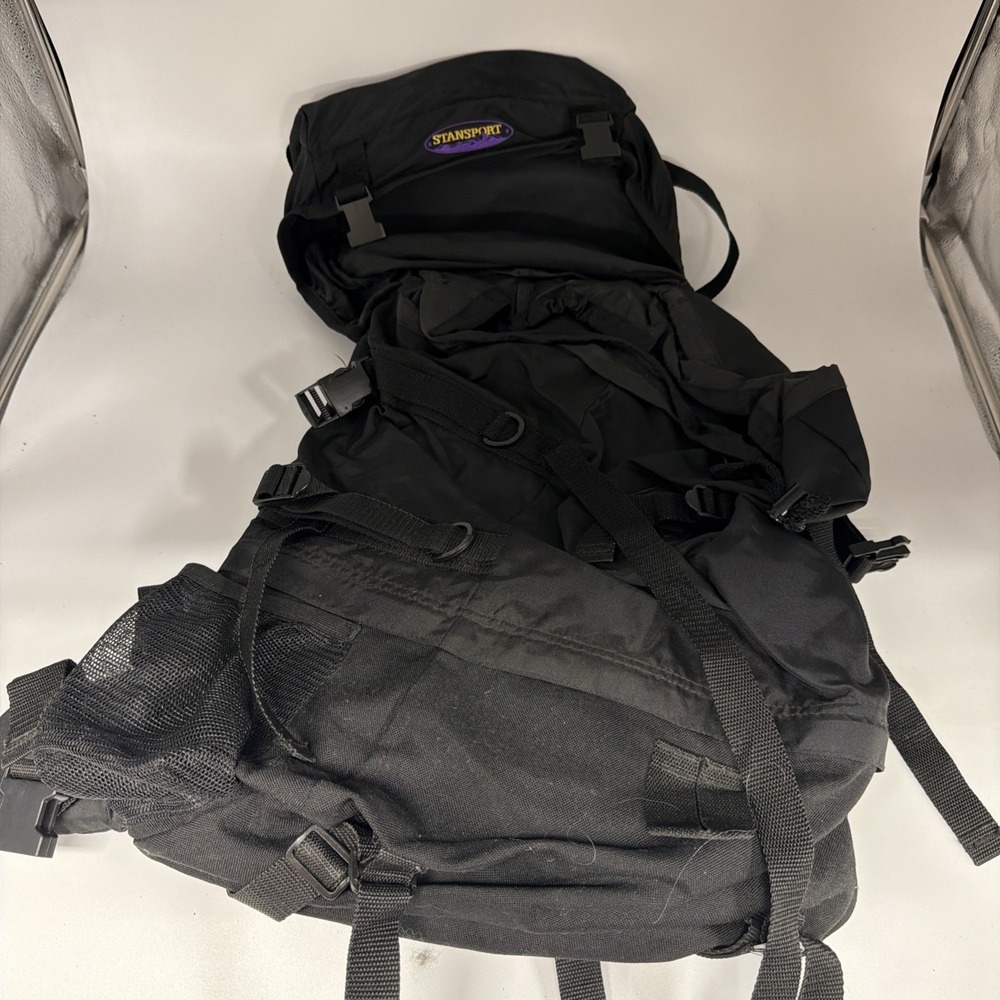 black Stansport hiking backpack features external adjustable straps